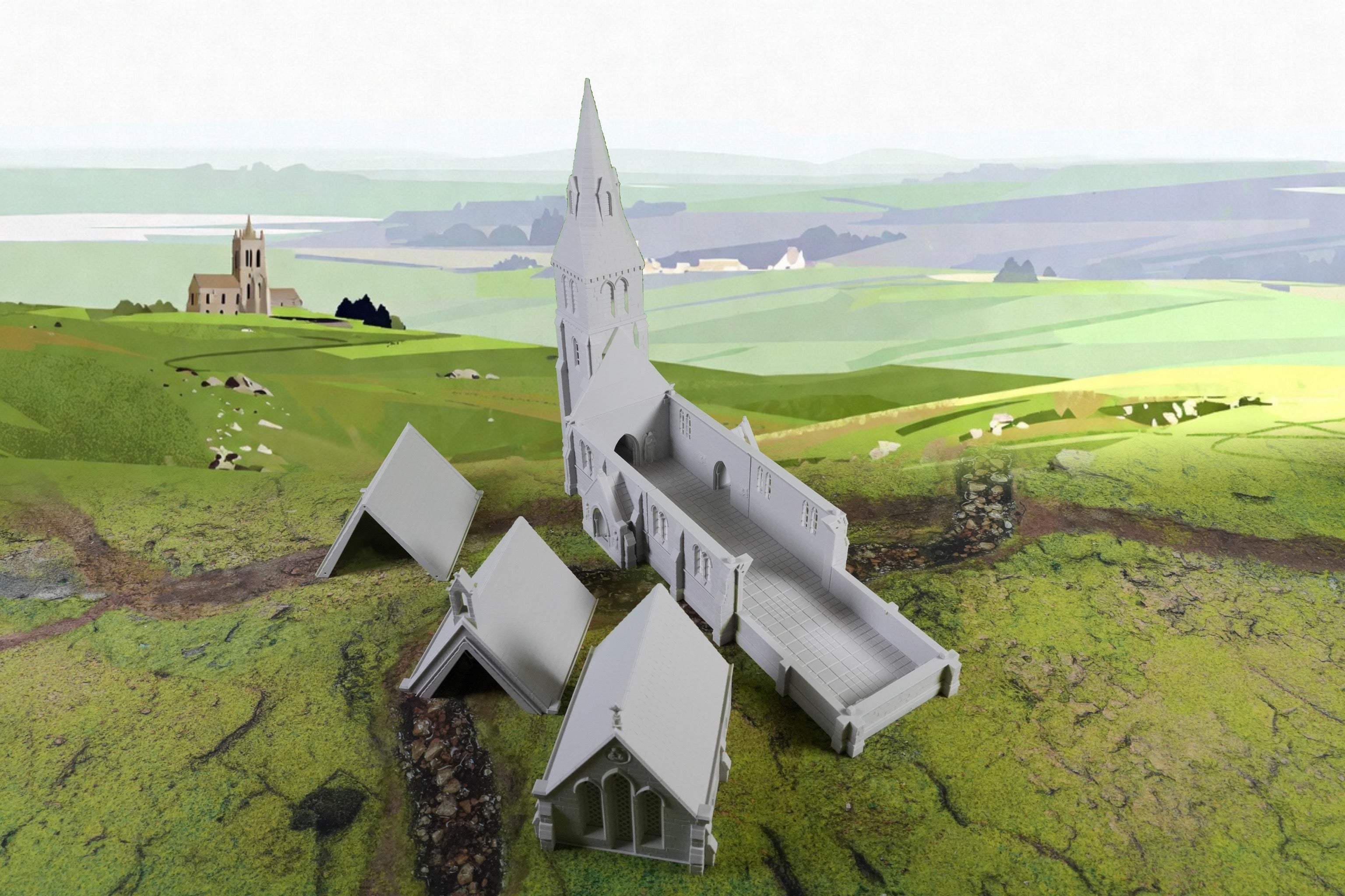 Graues mittelalterliches Kirchenmodell mit Turm auf grünem Geländebrett, verschiedene Größen.